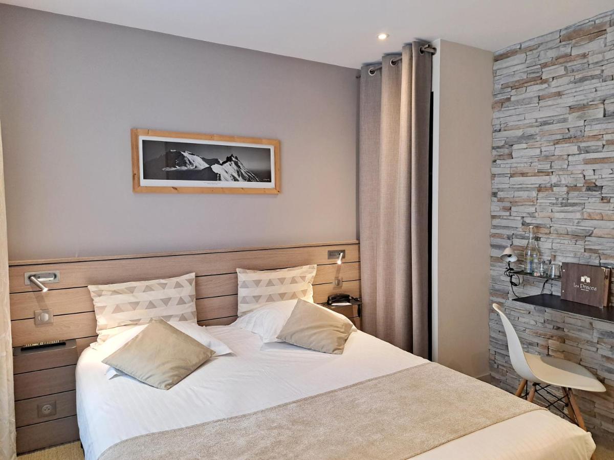 Un ou plusieurs lits dans un hébergement de l'établissement Hôtel des Princes, Chambéry Centre