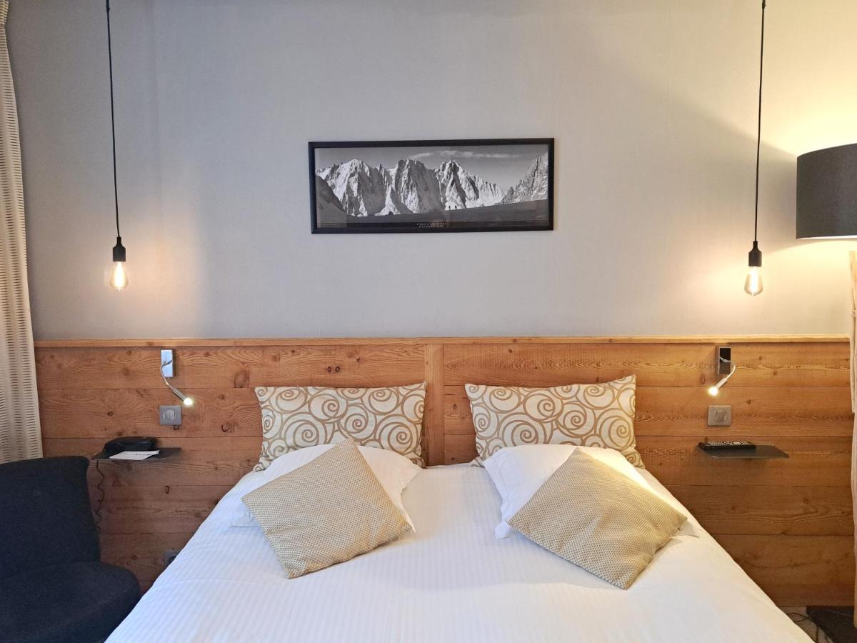 Un ou plusieurs lits dans un hébergement de l'établissement Hôtel des Princes, Chambéry Centre