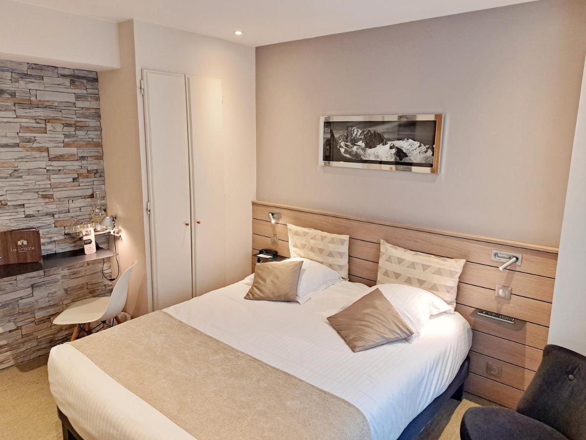 Un ou plusieurs lits dans un hébergement de l'établissement Hôtel des Princes, Chambéry Centre