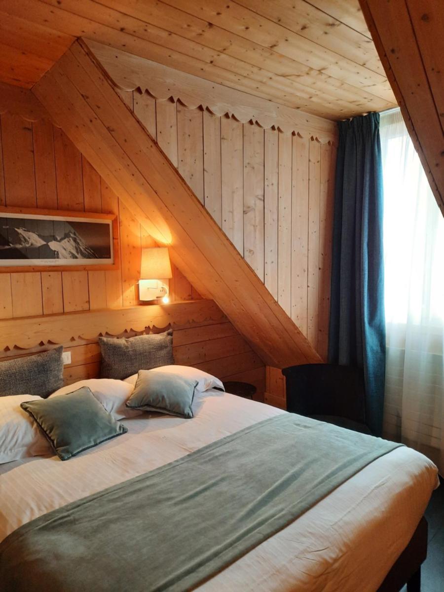 Un ou plusieurs lits dans un hébergement de l'établissement Hôtel des Princes, Chambéry Centre