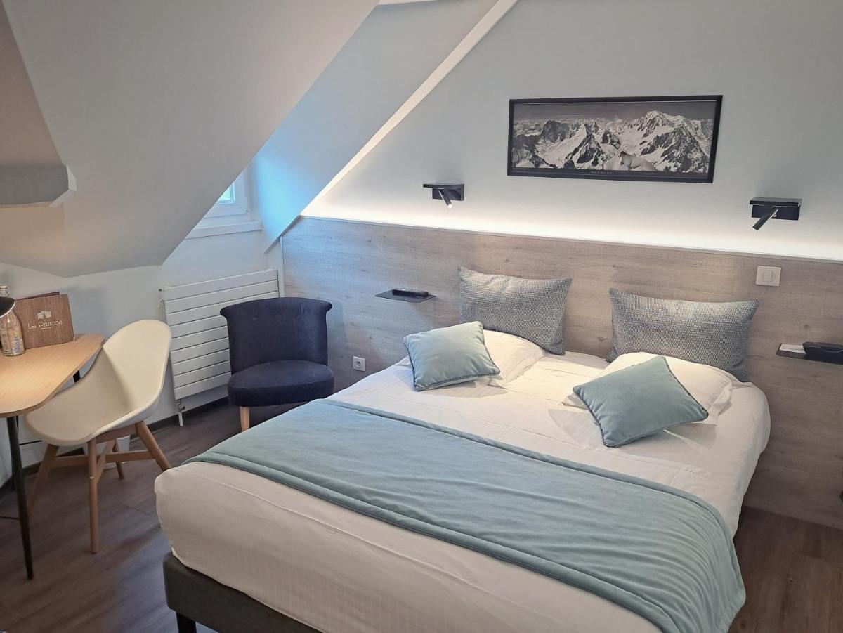 Un ou plusieurs lits dans un hébergement de l'établissement Hôtel des Princes, Chambéry Centre