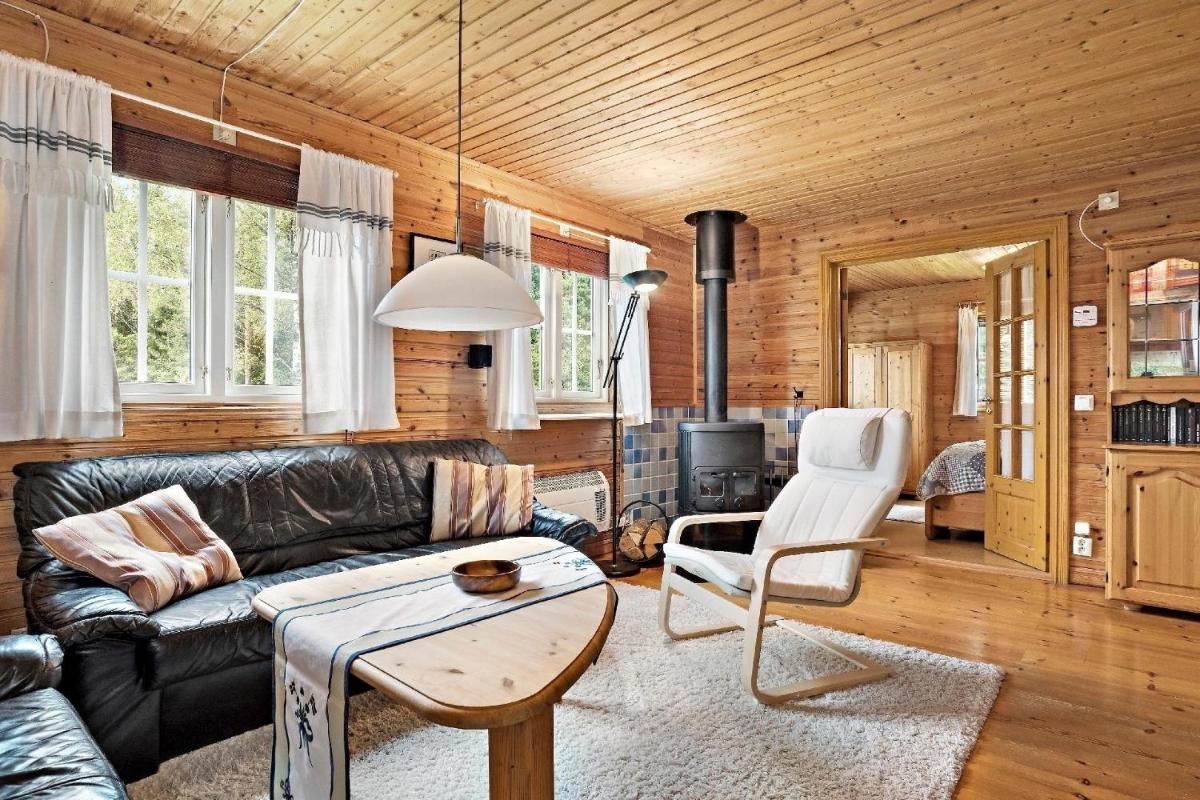 Idyllisch gelegenes ebenerdiges Ferienhaus mit Terrasse und Wintergarten mit traumhaften Blick in die Weite der Umgebung - Housity