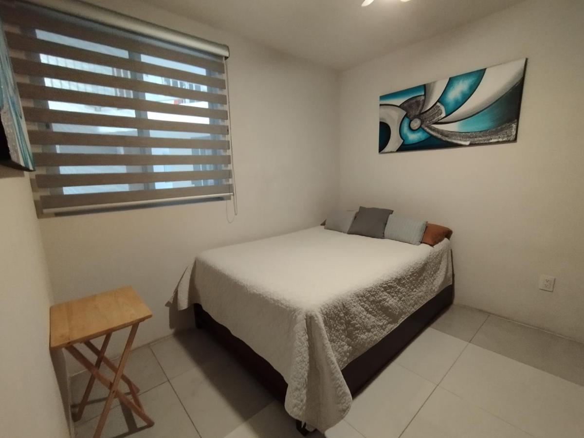 Céntrico y estiloso apartamento con Alberca, AC, Seguridad, Aparcamiento y Gym - Housity