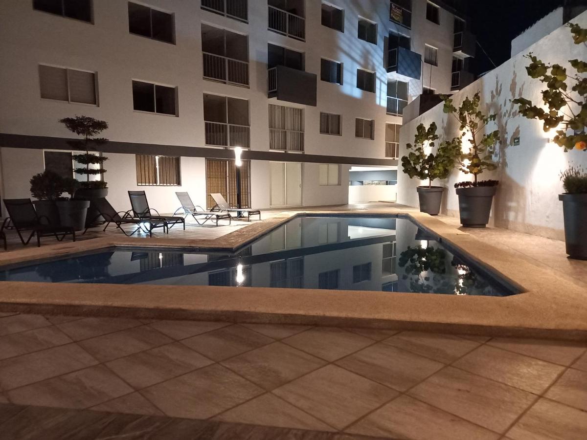 Céntrico y estiloso apartamento con Alberca, AC, Seguridad, Aparcamiento y Gym - Housity
