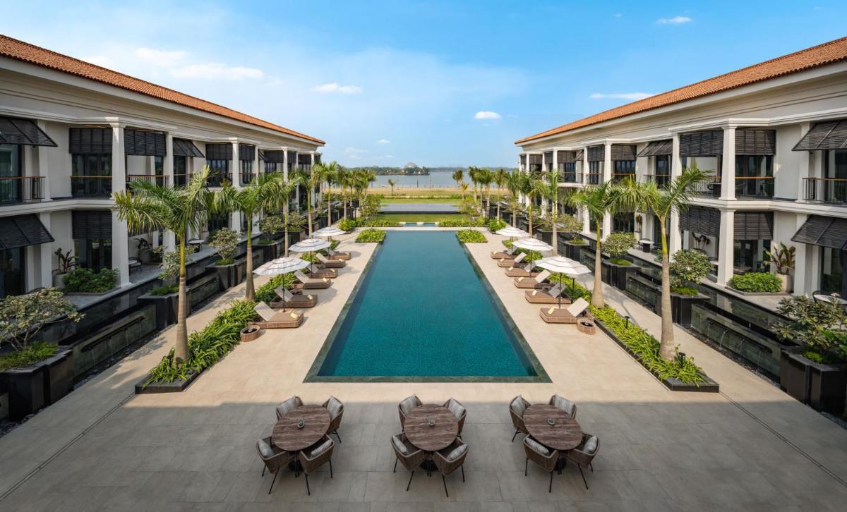 an aerial view of the pool at the resort at Taj Taal Kutir in Kolkata