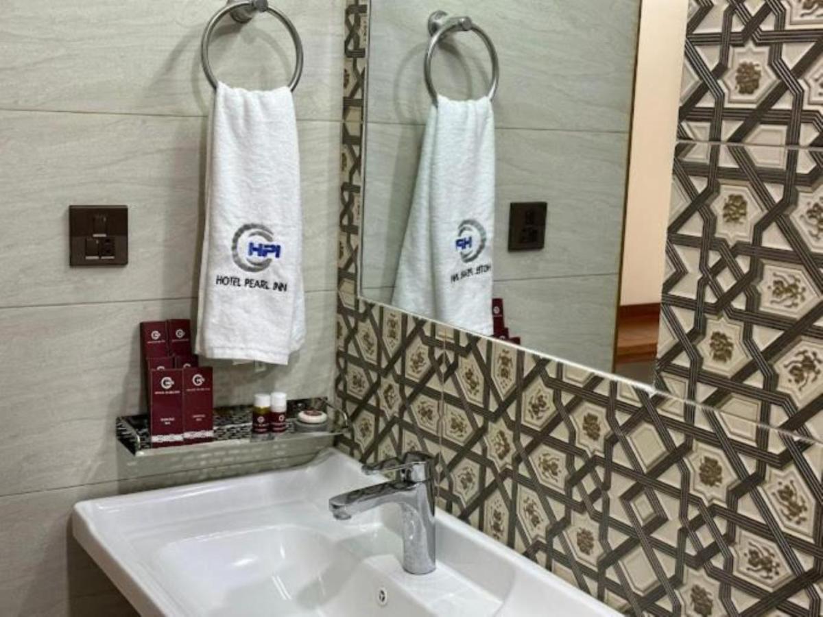 Pearl Inn Hotel - Housity