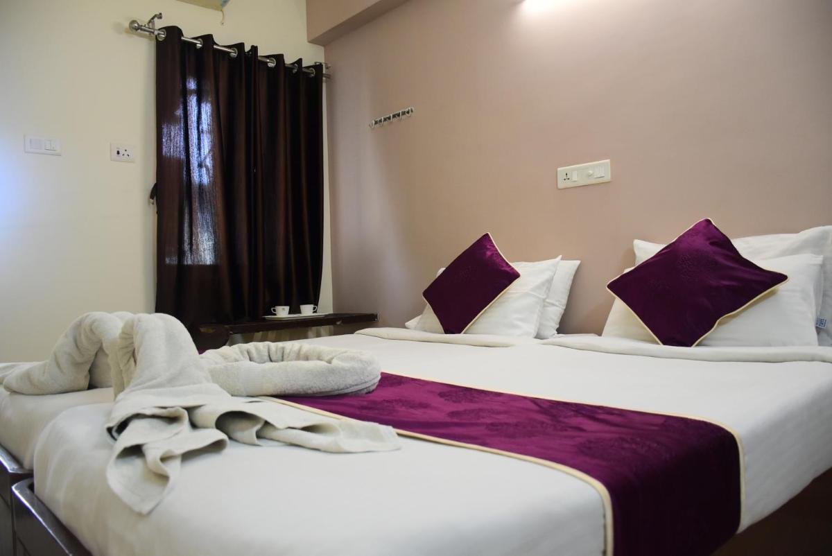 Naksha Tree Hotels (Kishoreinn-Koymbedu) - Housity