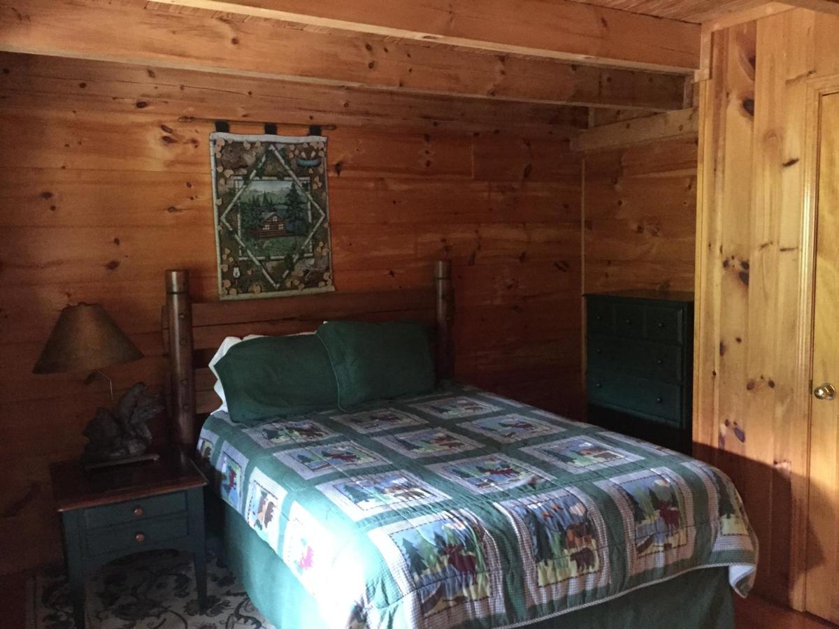 Highland Hills Motel & Cabins - Housity
