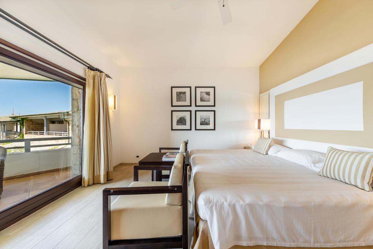 Un ou plusieurs lits dans un hébergement de l'établissement Hotel & SPA des Pecheurs