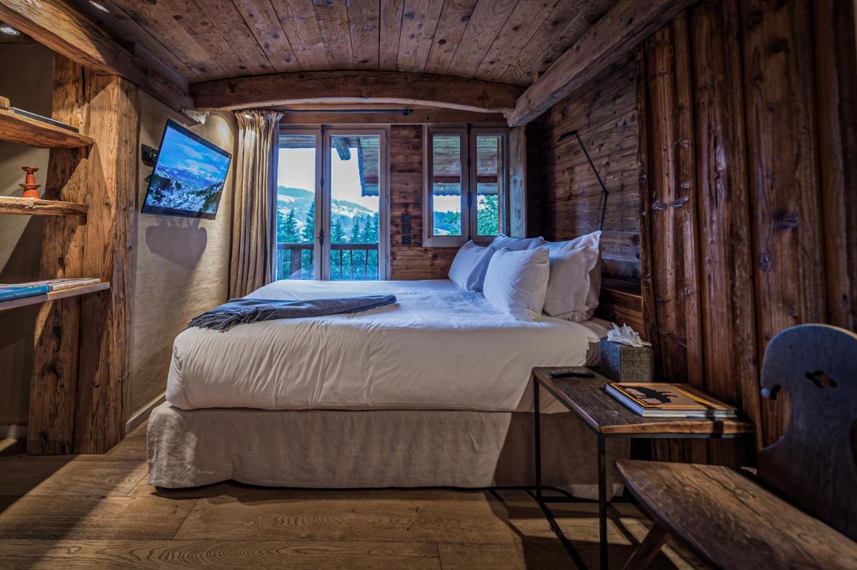 Un ou plusieurs lits dans un hébergement de l'établissement Zannier Le Chalet