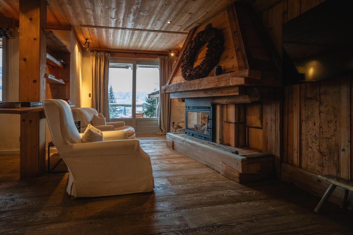 Coin salon dans l'établissement Zannier Le Chalet