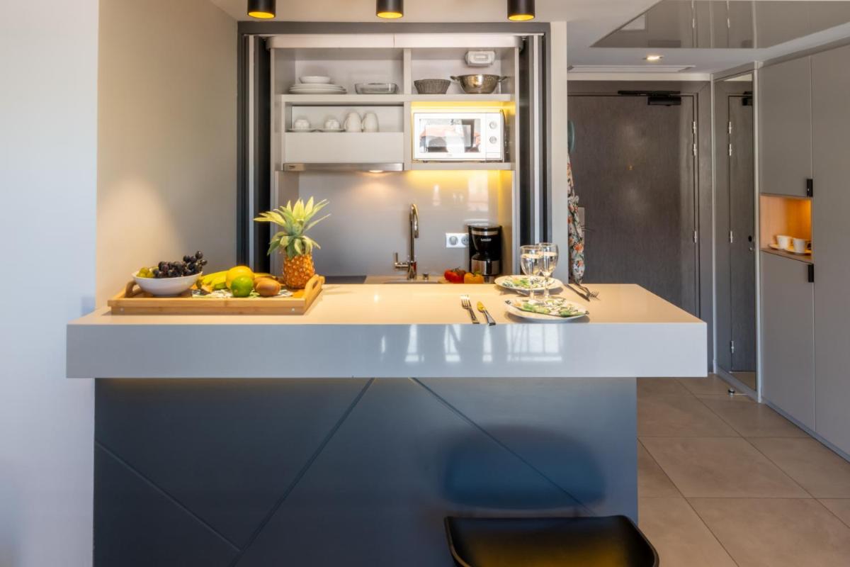 Cuisine ou kitchenette dans l'établissement Nemea Appart Hotel Cannes Palais