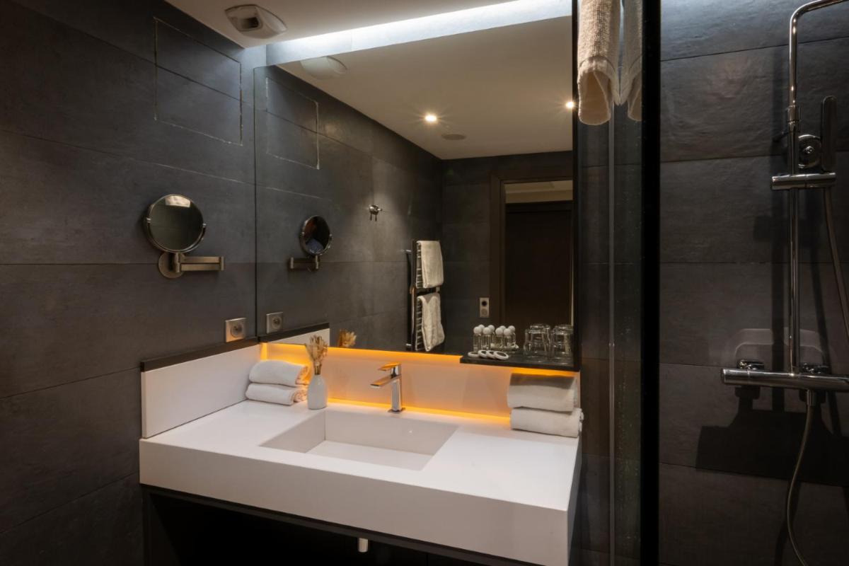 Salle de bains dans l'établissement Nemea Appart Hotel Cannes Palais