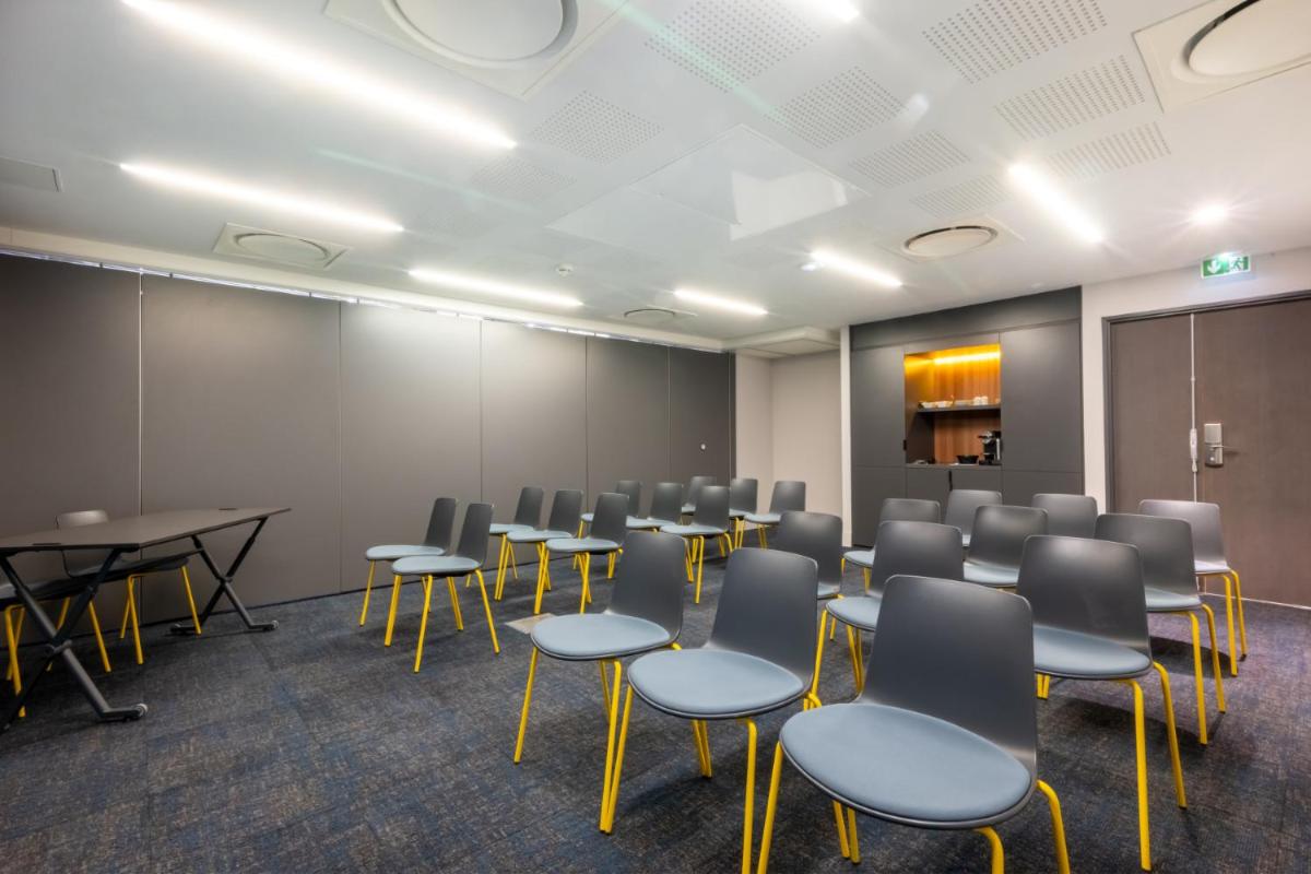 Coin salon dans l'établissement Nemea Appart Hotel Cannes Palais