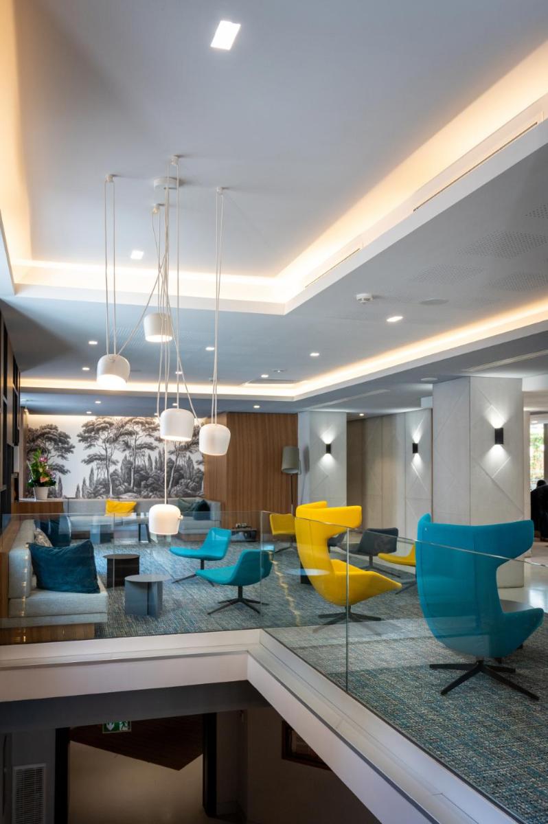 Coin salon dans l'établissement Nemea Appart Hotel Cannes Palais
