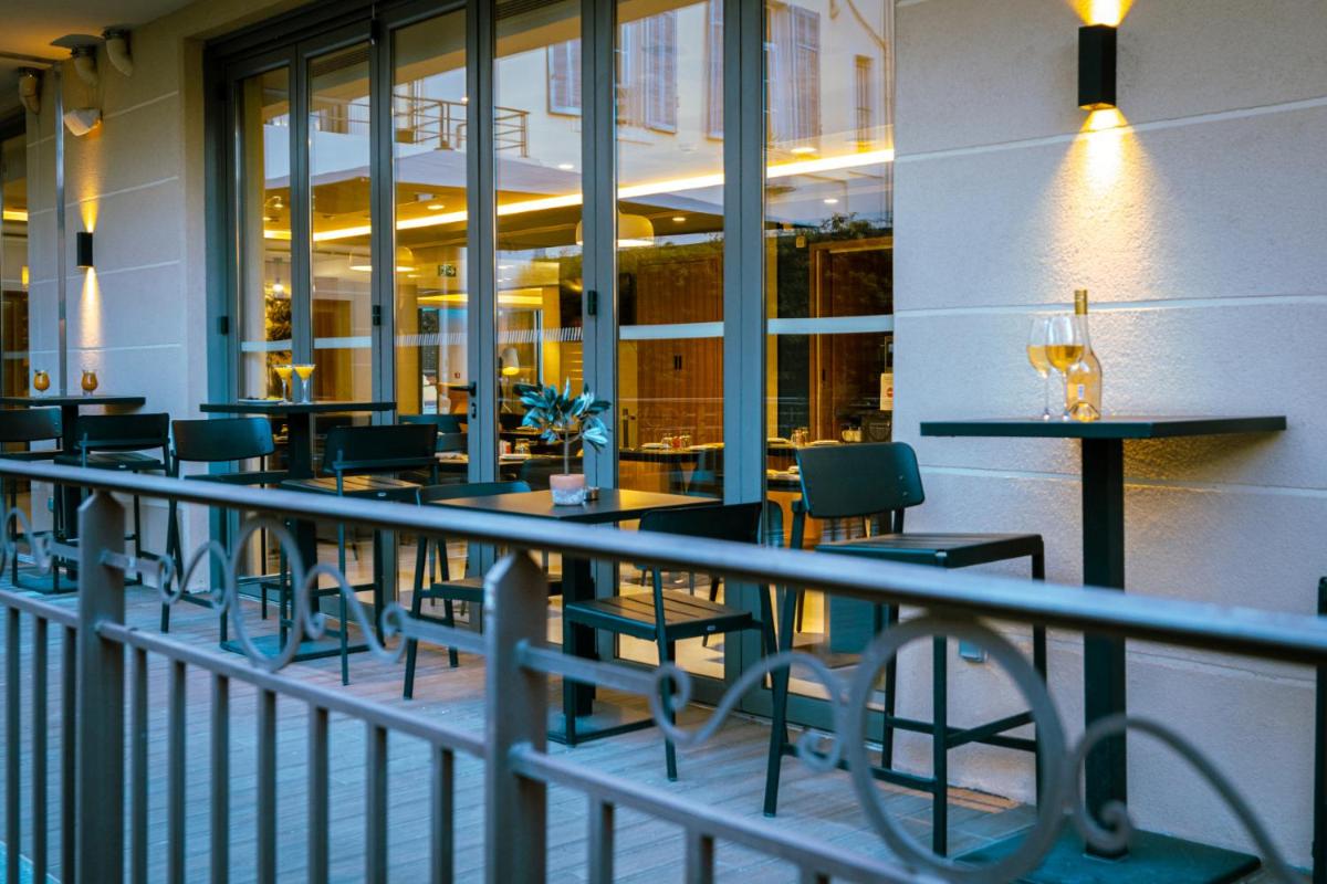 Restaurant ou autre lieu de restauration dans l'établissement Nemea Appart Hotel Cannes Palais