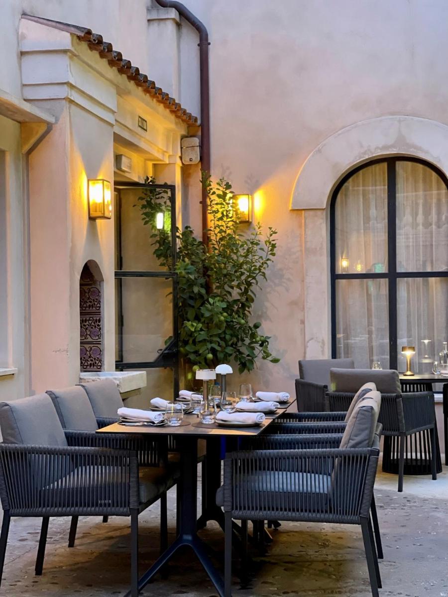 Zona de estar de Hotel & Restaurant Jardi d'Artà