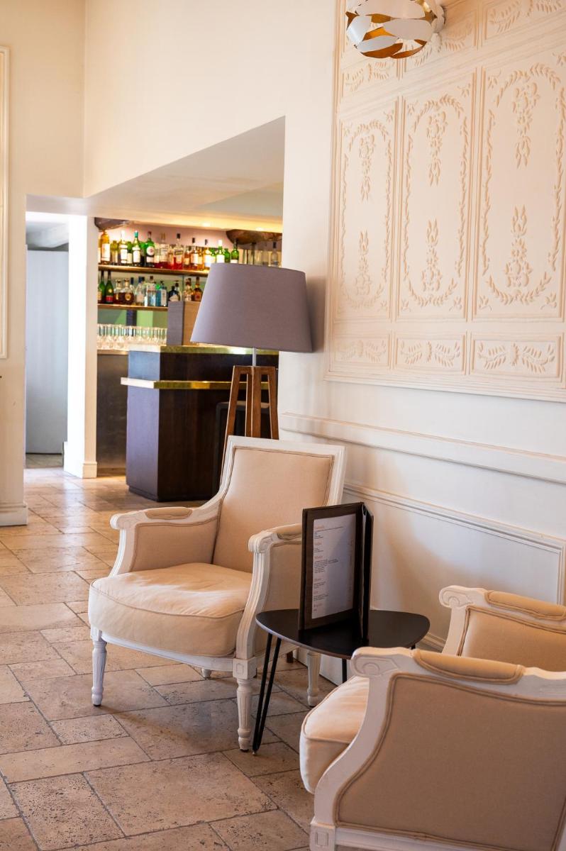 Coin salon dans l'établissement Moulin de Vernègues Hôtel & Spa