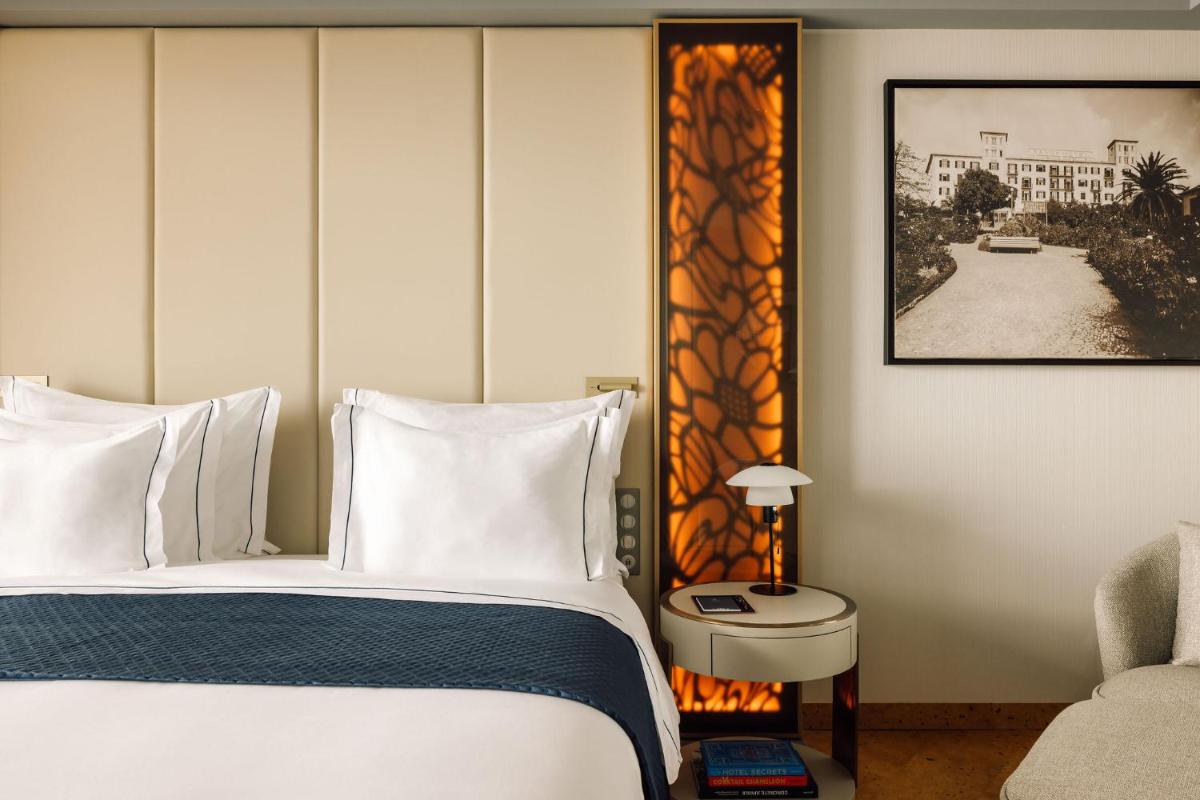 Uma cama ou camas num quarto em The Reserve - within Savoy Palace - The Leading Hotels of the World