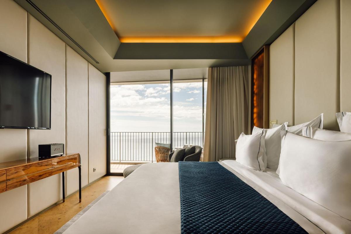 Uma cama ou camas num quarto em The Reserve - within Savoy Palace - The Leading Hotels of the World