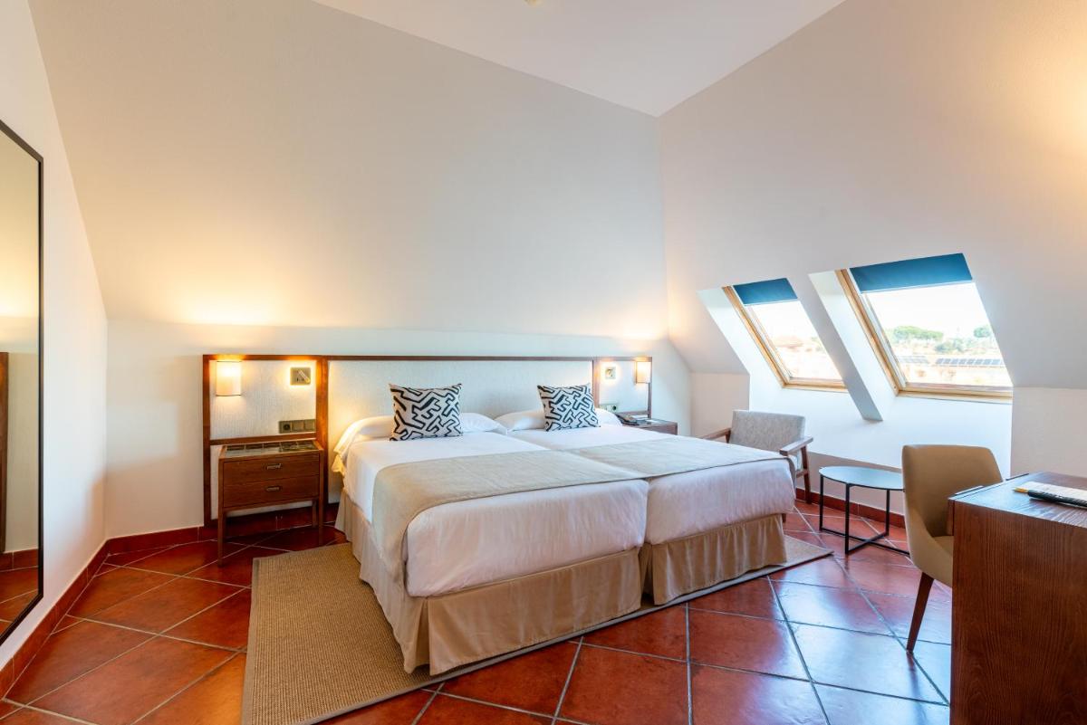 Cama o camas de una habitación en Puerto Antilla Grand Hotel