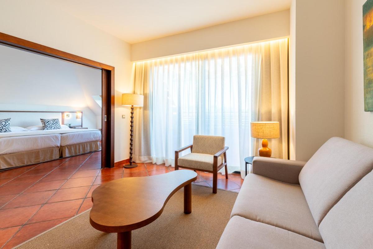 Cama o camas de una habitación en Puerto Antilla Grand Hotel