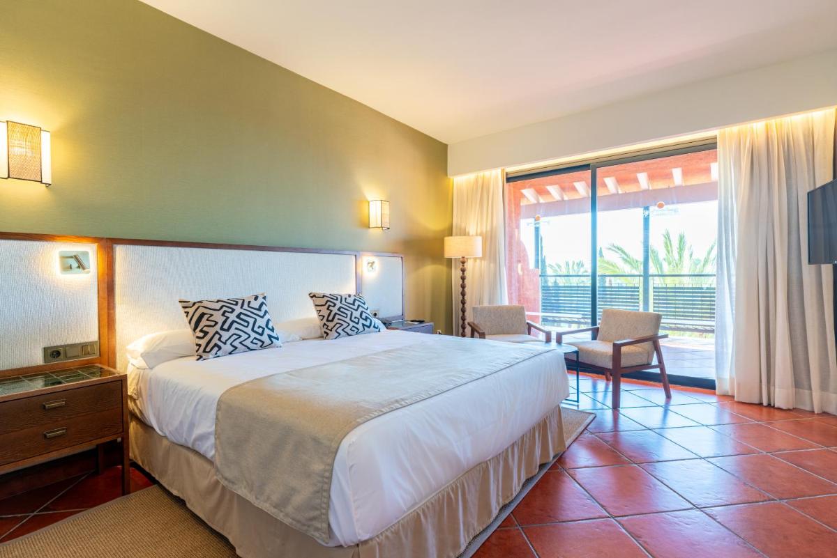 Cama o camas de una habitación en Puerto Antilla Grand Hotel