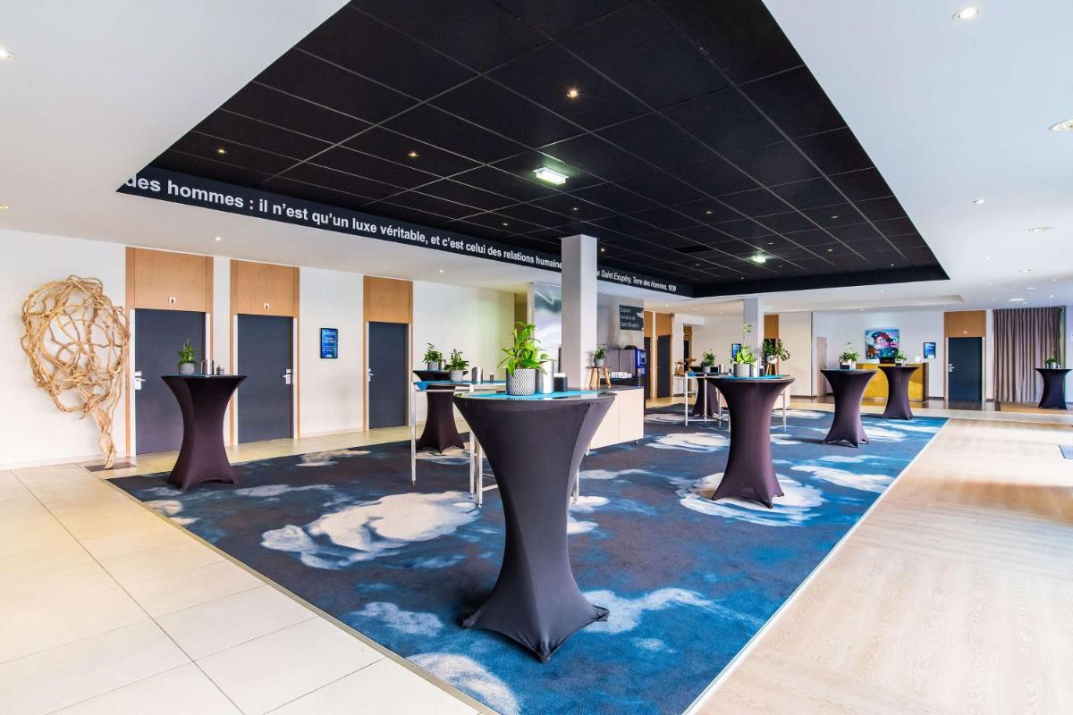 Restaurant ou autre lieu de restauration dans l'établissement Radisson Blu Hotel Toulouse Airport