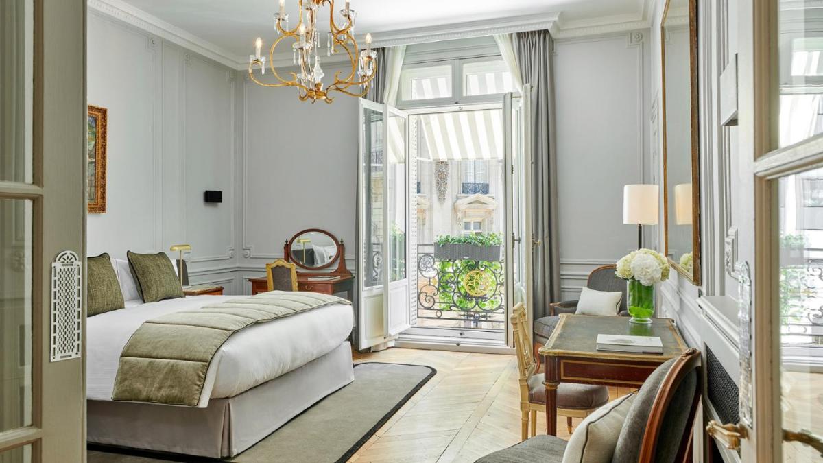 Un ou plusieurs lits dans un hébergement de l'établissement Hôtel Lancaster Paris Champs-Elysées