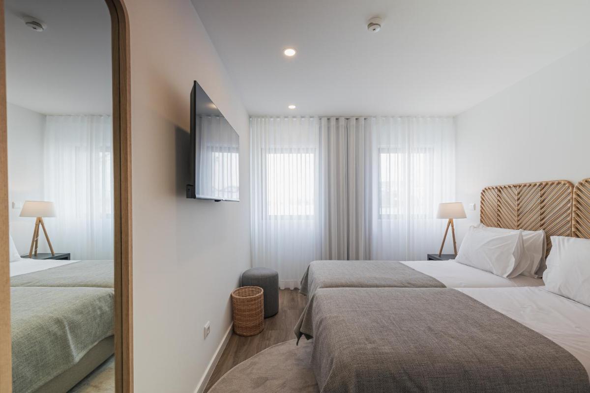 Uma cama ou camas num quarto em Alto do Forte