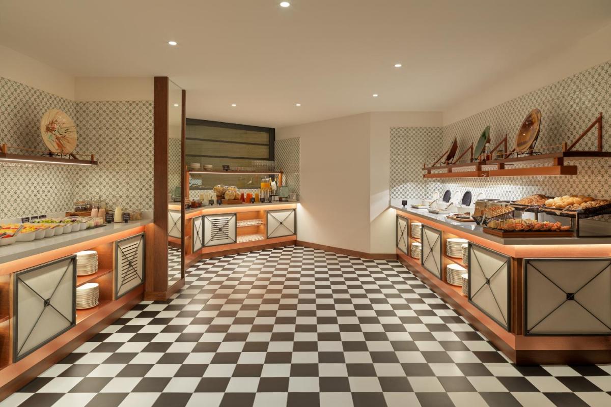 Una cocina o zona de cocina en H10 Casanova
