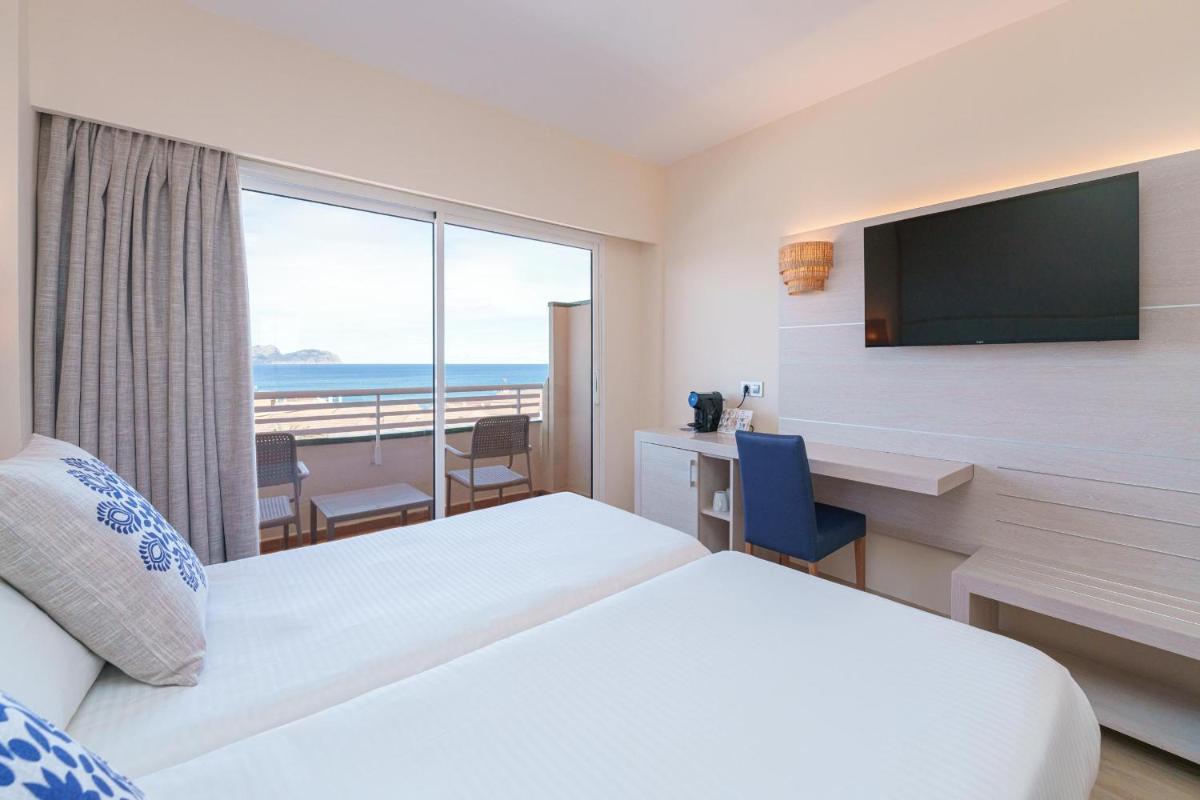 Cama o camas de una habitación en Ferrer Janeiro Hotel & Spa