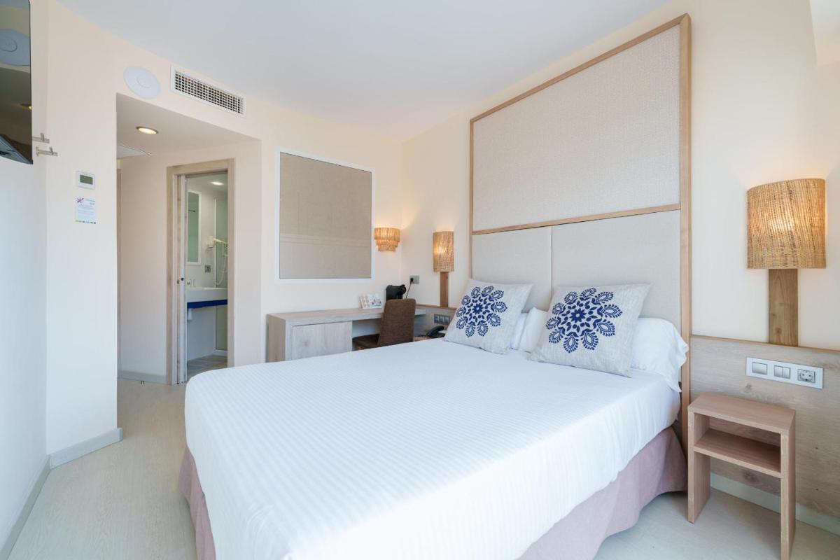 Cama o camas de una habitación en Ferrer Janeiro Hotel & Spa
