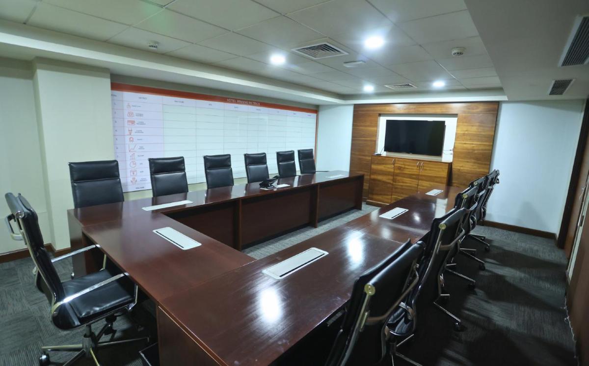a conference room with a long table and chairs at InterContinental Jaipur Tonk Road by IHG in Jaipur
