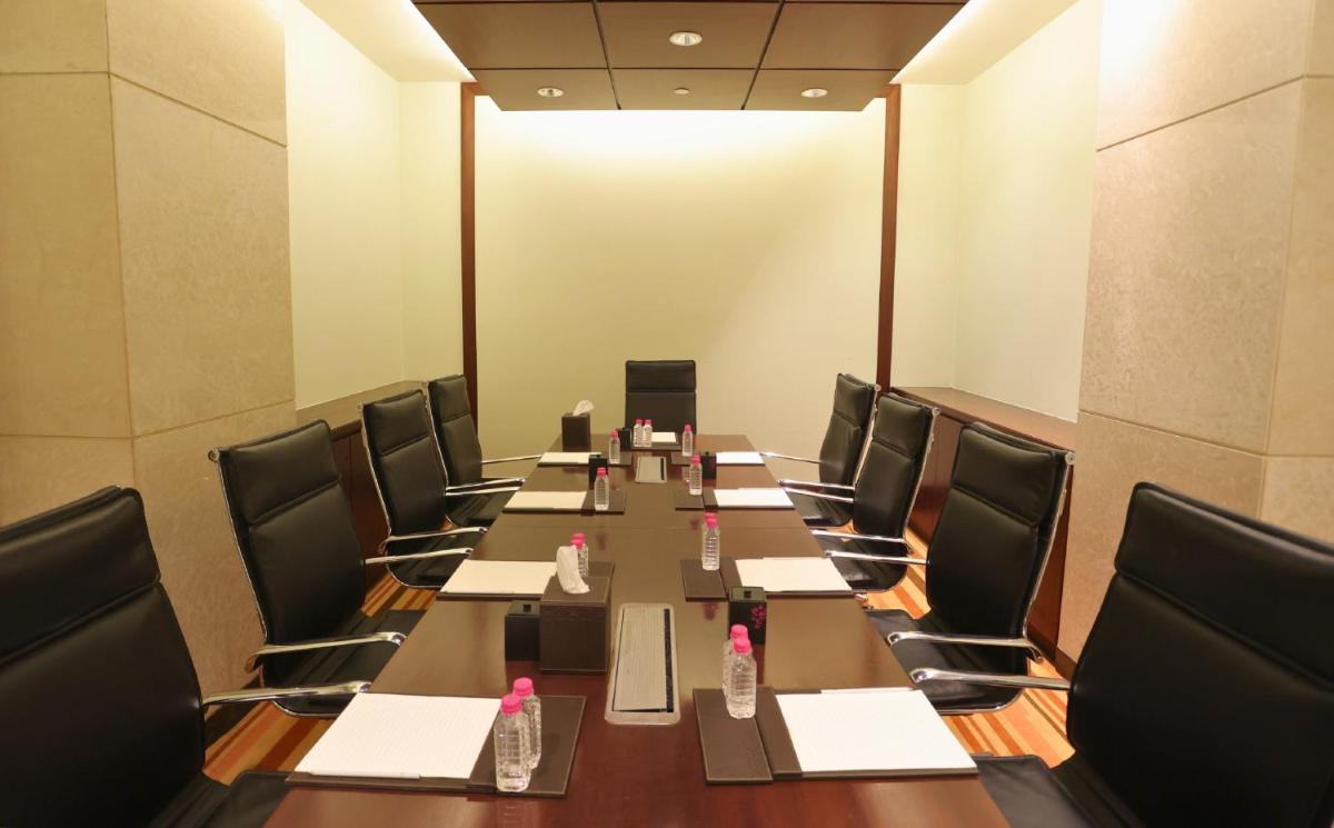a conference room with a long table and chairs at InterContinental Jaipur Tonk Road by IHG in Jaipur