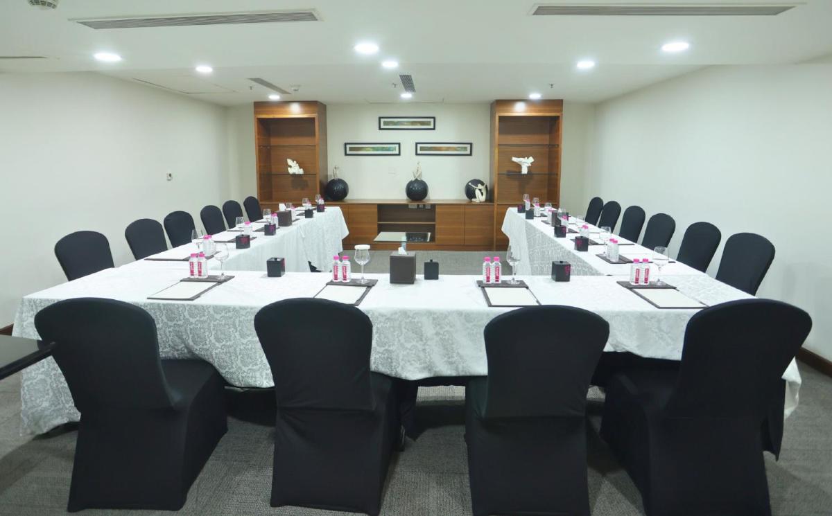 a conference room with a large table and chairs at InterContinental Jaipur Tonk Road by IHG in Jaipur