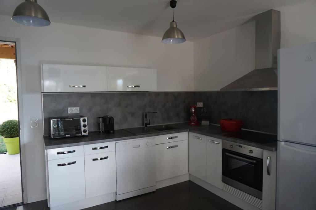 Appartement F4 neuf avec jardin et cuisine d'été - Housity