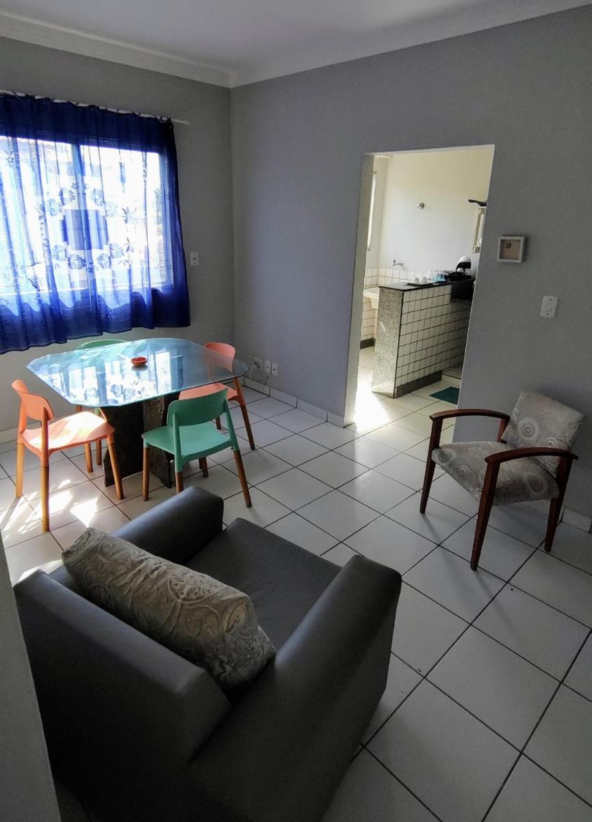 Ed Bertholi - Vista lateral do mar com garagem - Housity