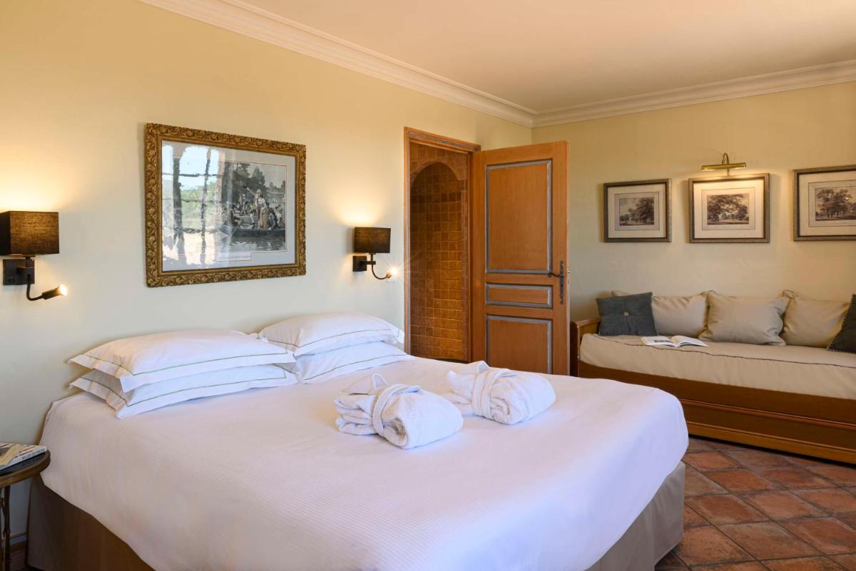 Un ou plusieurs lits dans un hébergement de l'établissement La Bastide du Calalou Hotel & Spa, BW Signature Collection