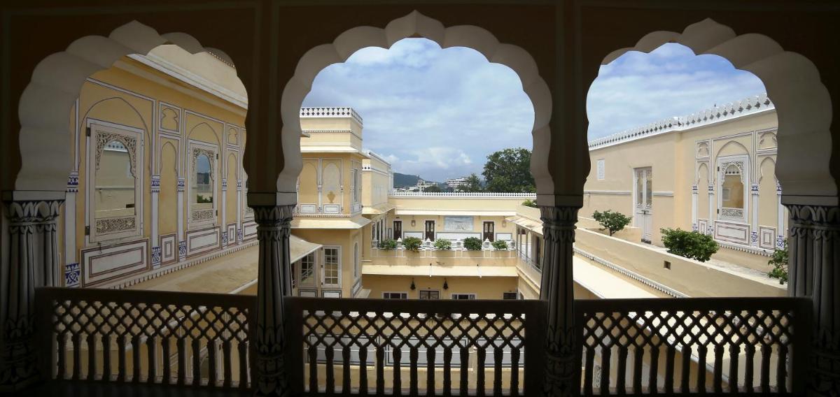 a view of a courtyard from a window of a building at The Raj Palace (Small Luxury Hotels of the World) in Jaipur