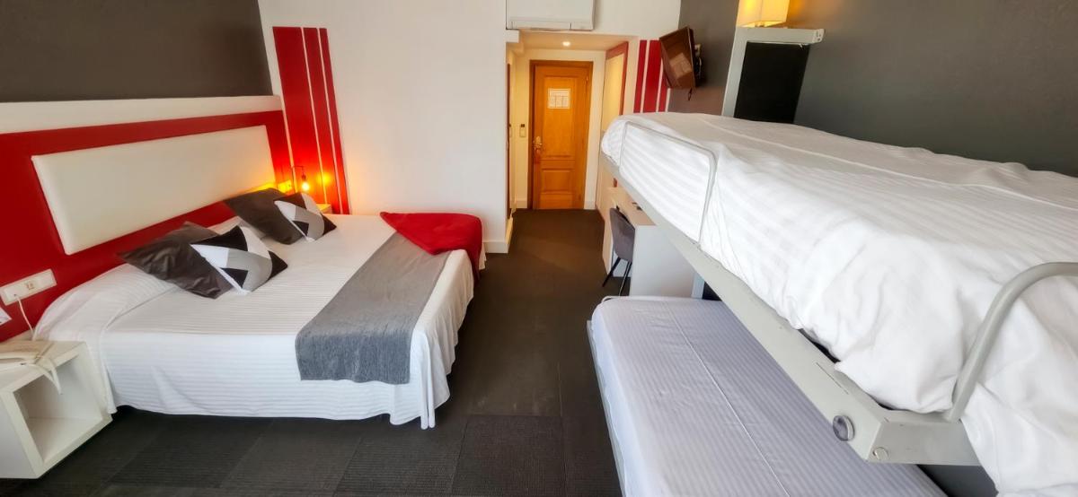 Cama o camas de una habitación en Hotel Spa El Muelle de Suances