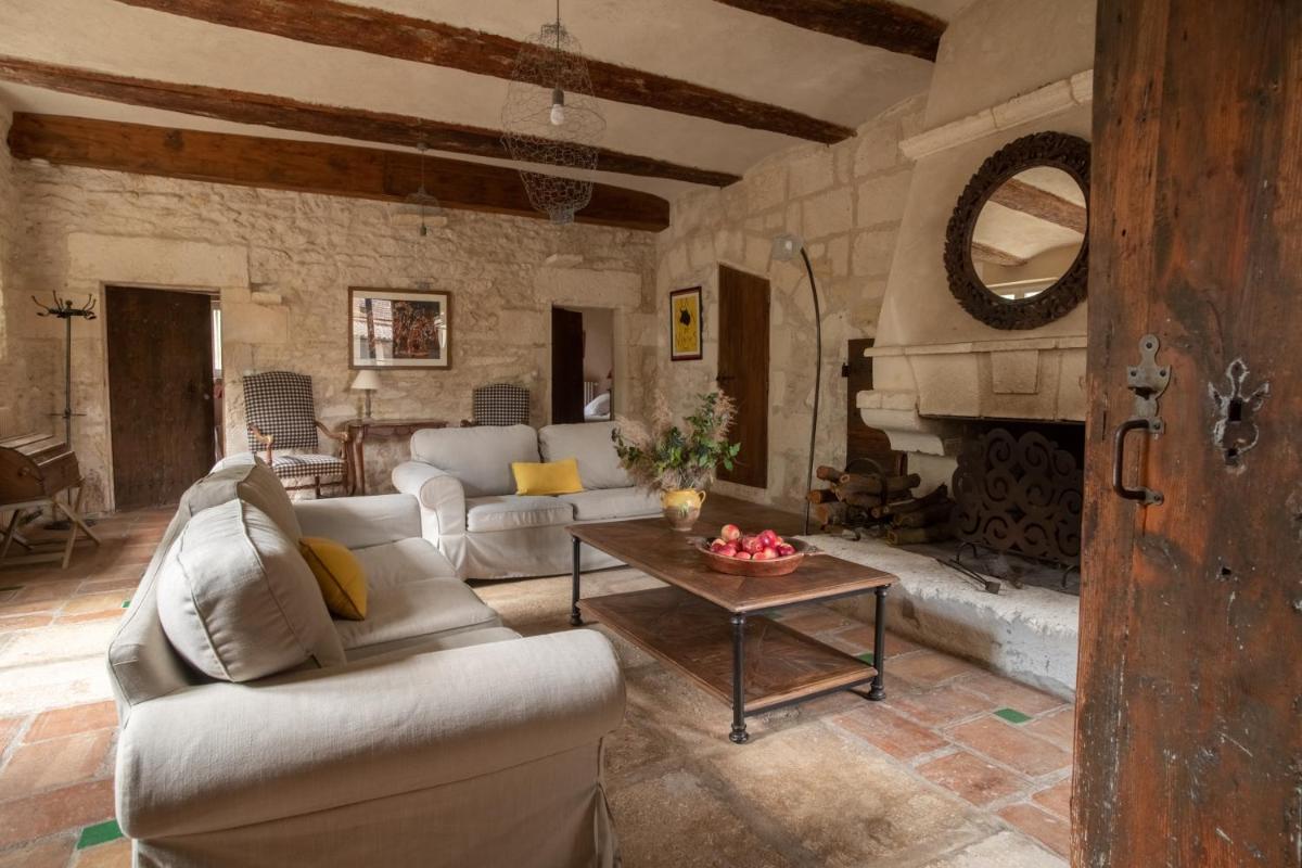 Coin salon dans l'établissement HOTEL et APPARTEMENTS DOMAINE DES CLOS - Teritoria