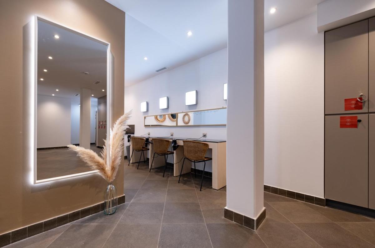 Un ou plusieurs lits dans un hébergement de l'établissement Zenitude Hotel La Valadière, Ascend Hotel Collection