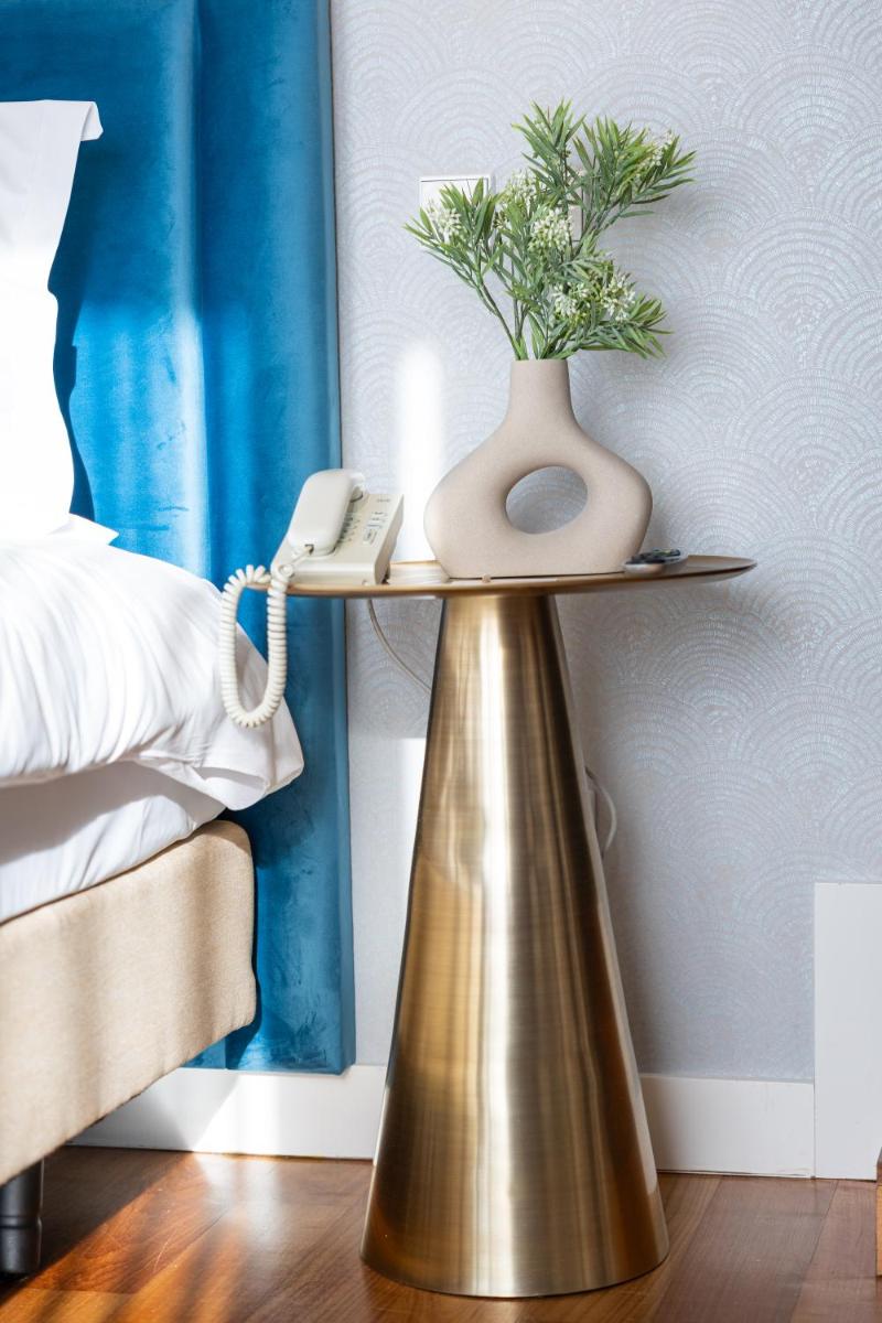 Uma cama ou camas num quarto em Pestana Cidadela Cascais - Pousada & Art District
