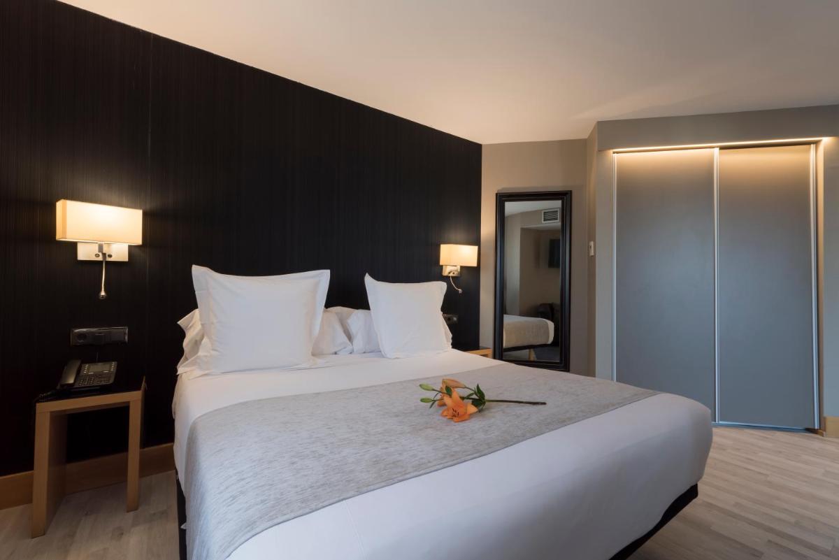 Cama o camas de una habitación en Hotel Plaza
