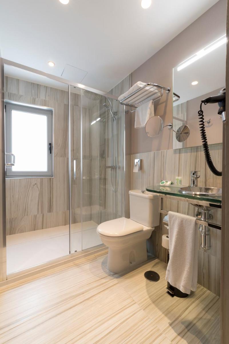 Un baño de Hotel Plaza