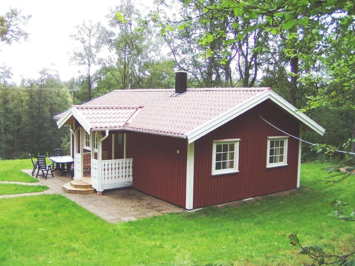 Charmantes Holzhaus mit Nebengebäude - Housity