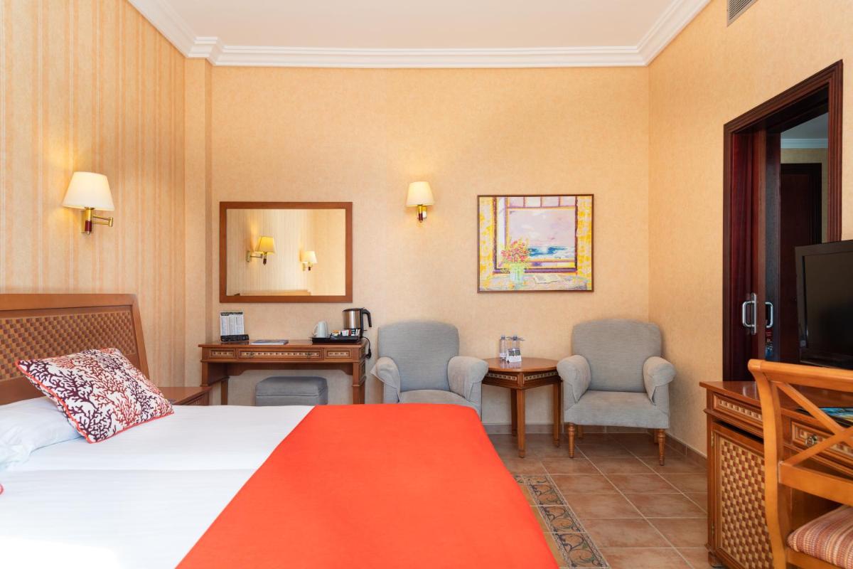 Cama o camas de una habitación en Hotel Cordial Mogán Playa