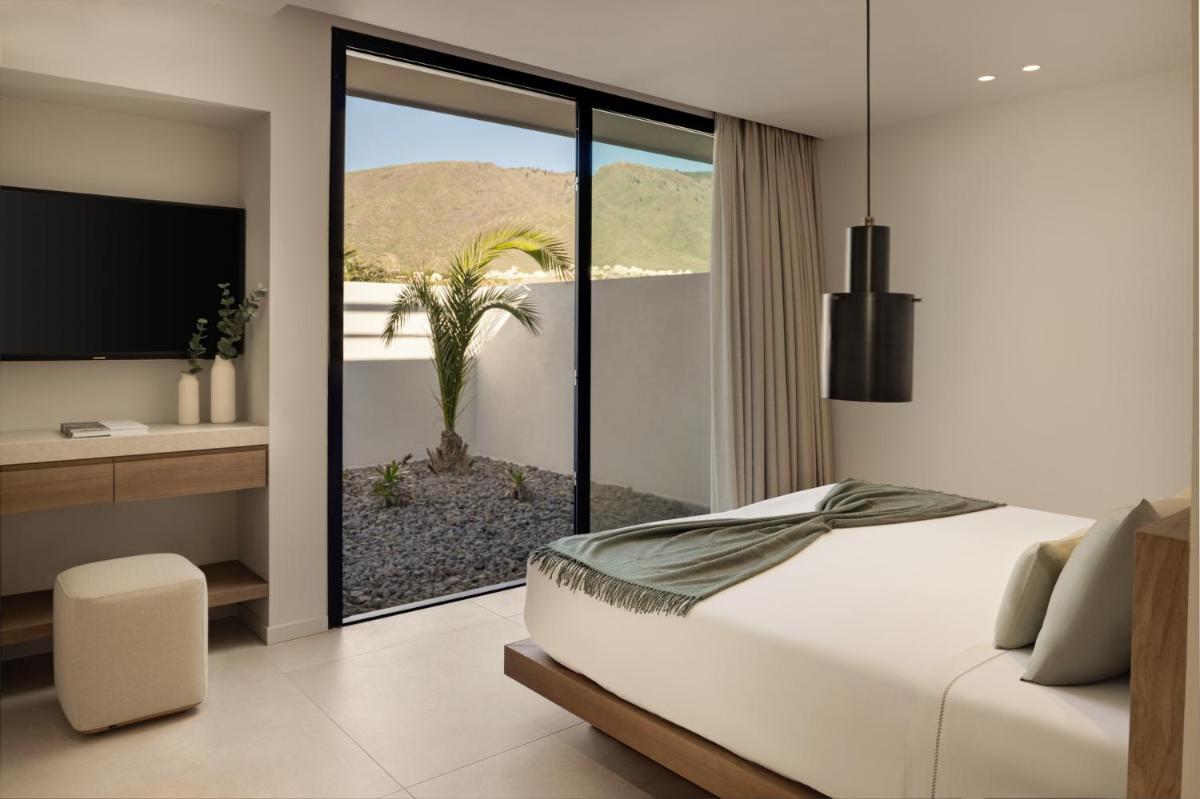 Cama o camas de una habitación en Royal Hideaway Corales Villas