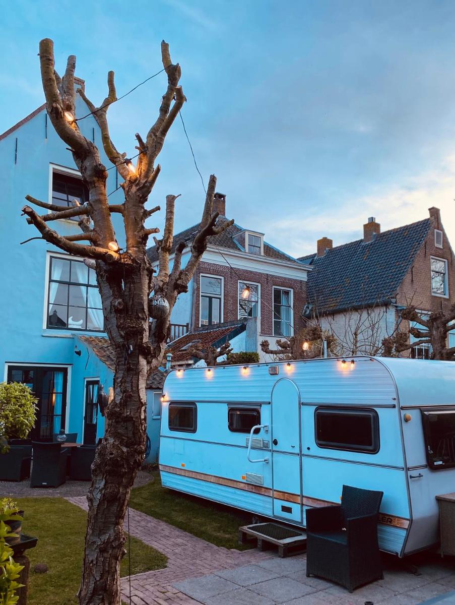 Vintage Glamping Caravan Stadstuin Goedereede - Housity